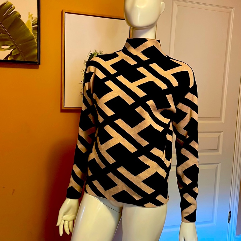 High-neck sweater. Never worn.